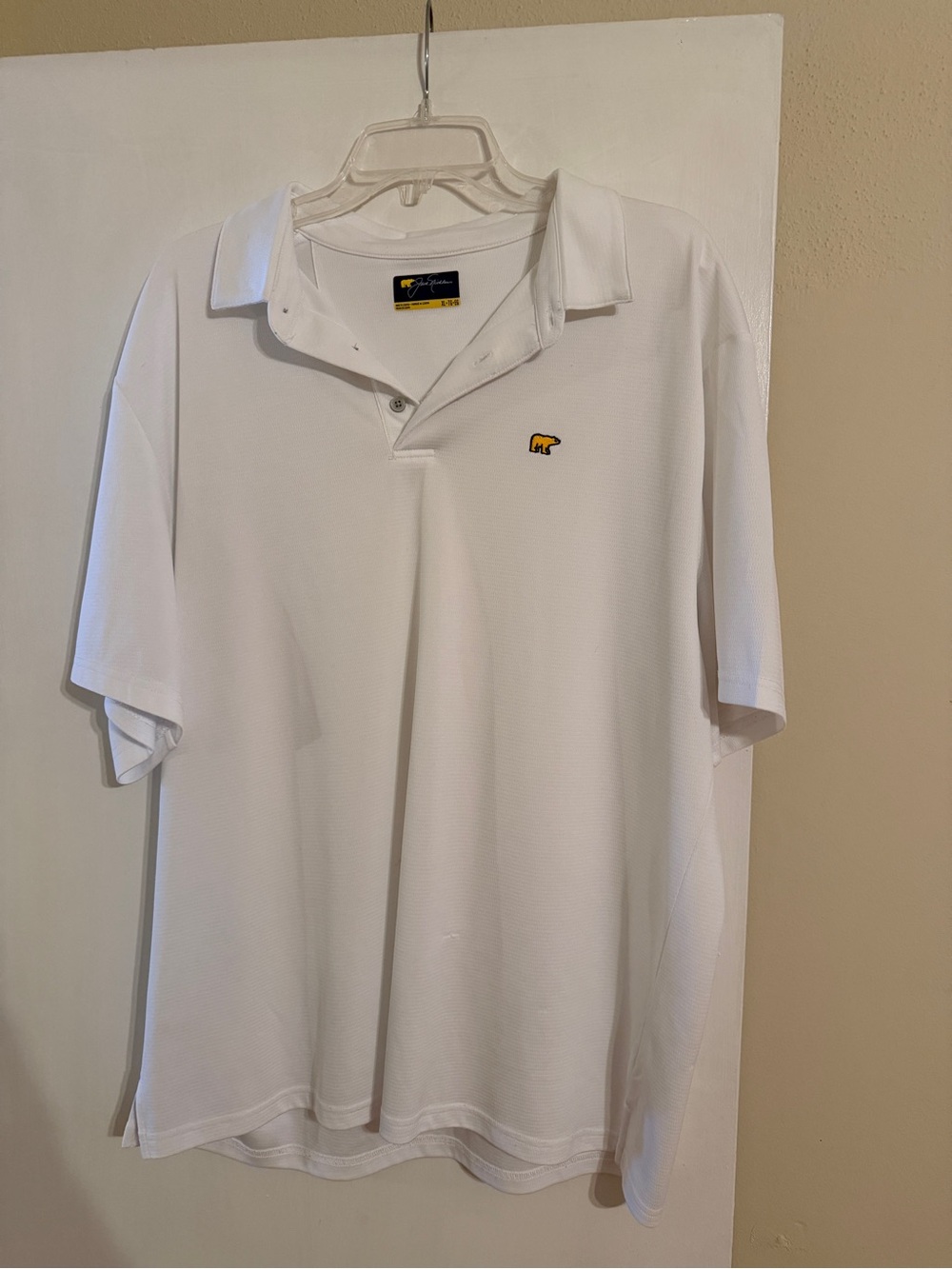 Men's White Polo with Yellow Bear Accent